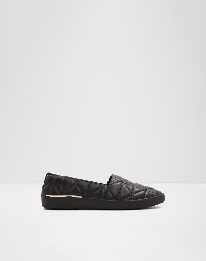 Black quilted 2025 slip ons