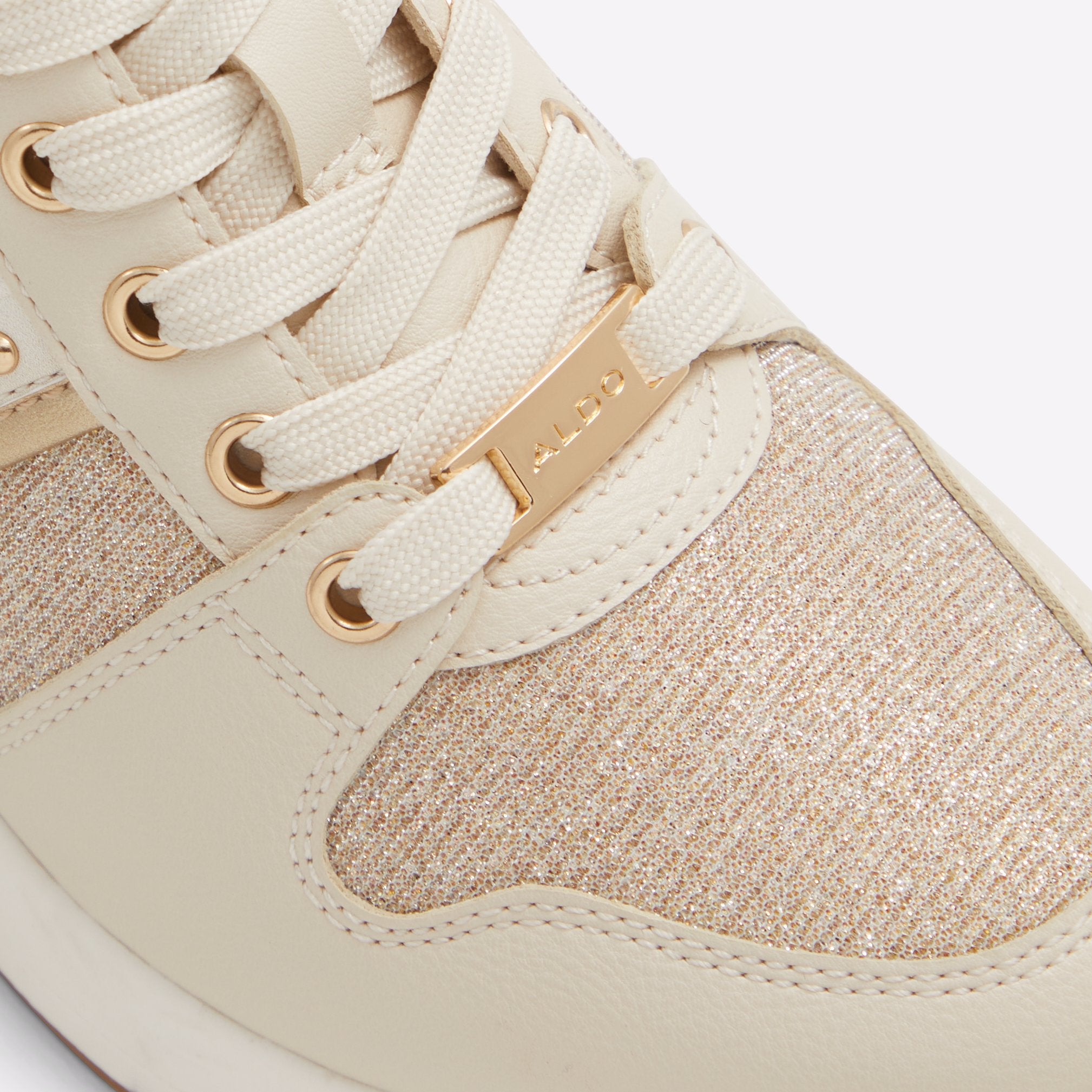 Aldo gold sneakers online